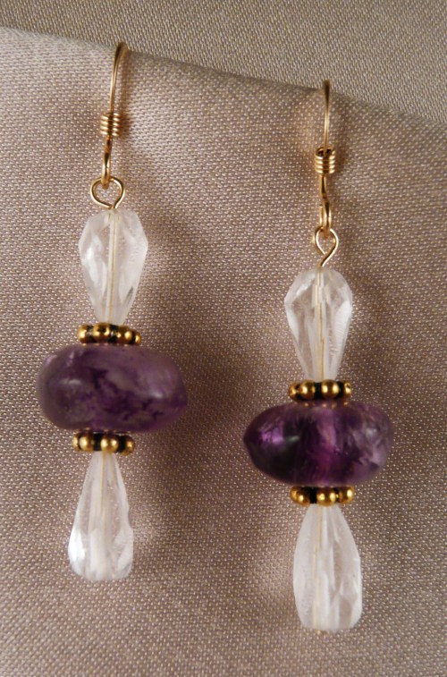 Faceted rock crystals set off nuggets of amethyst